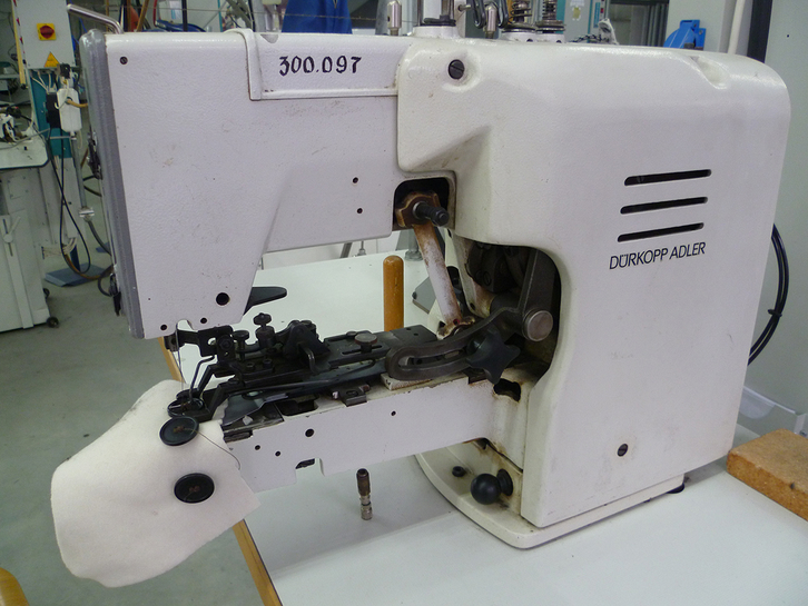 Button-attaching sewing machine