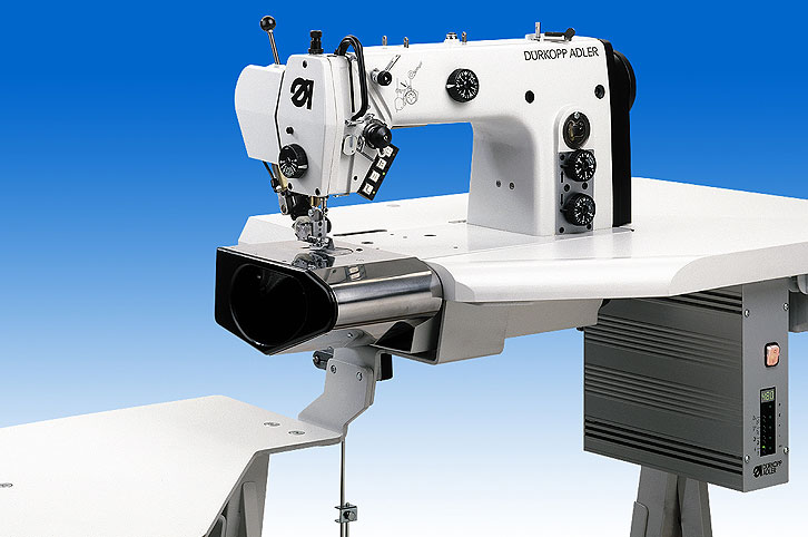 Engineered sewing station for stitching through straight waistbands of trousers and skirts