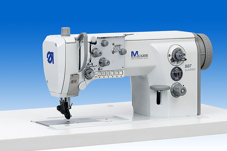 Single needle lockstitch flatbed machine with DA Direct Drive, wheel feed